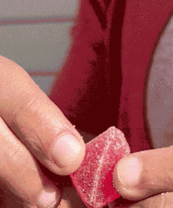 Opening a cherry gummy