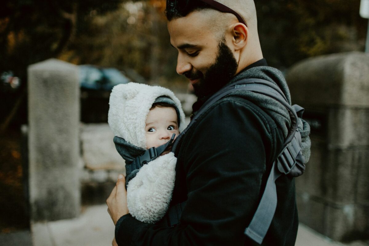 Man holding baby